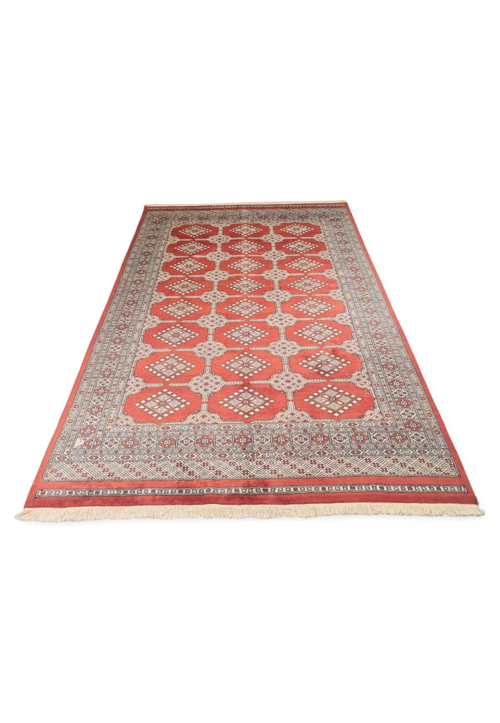 Hand-knotted wool pile of brick red Bokhara rug, 156×239cm