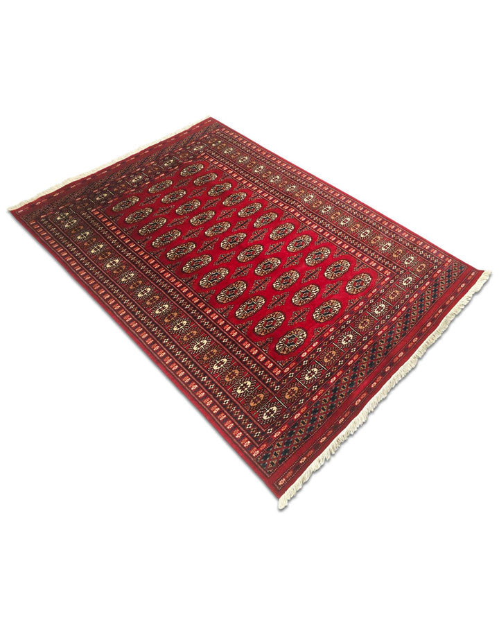 One-of-a-kind bright red Pakistani Bokhara wool rug
