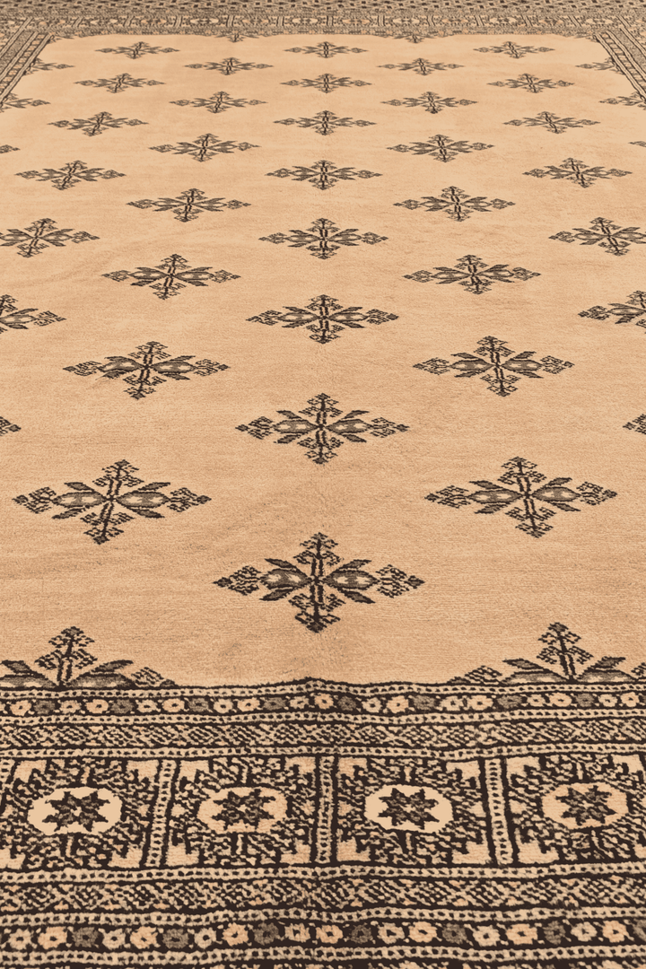 One-of-a-kind peach scattered cross Pakistani Bokhara rug