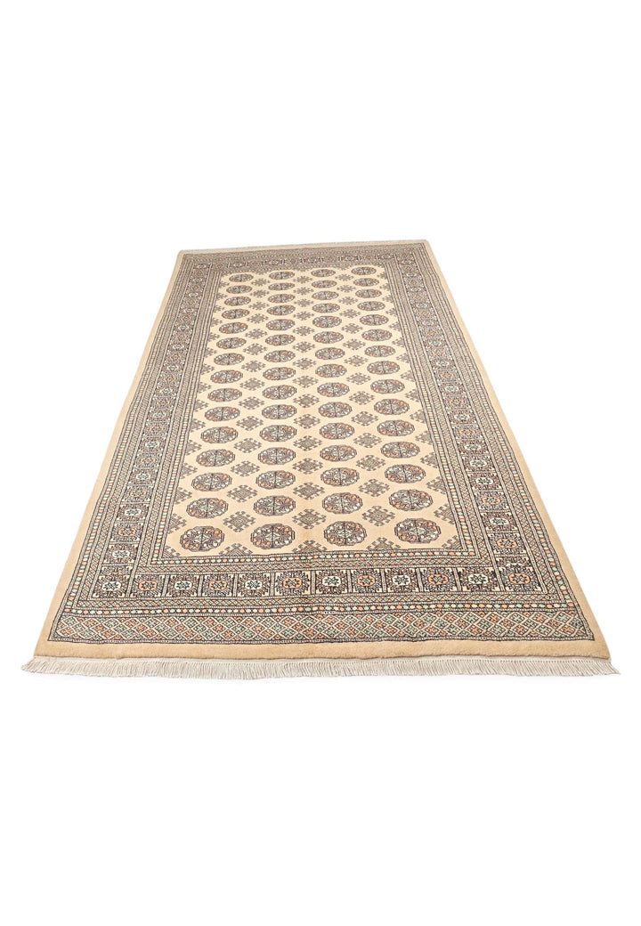 Hand-knotted wool pile of warm gold Bokhara rug, 151×252cm