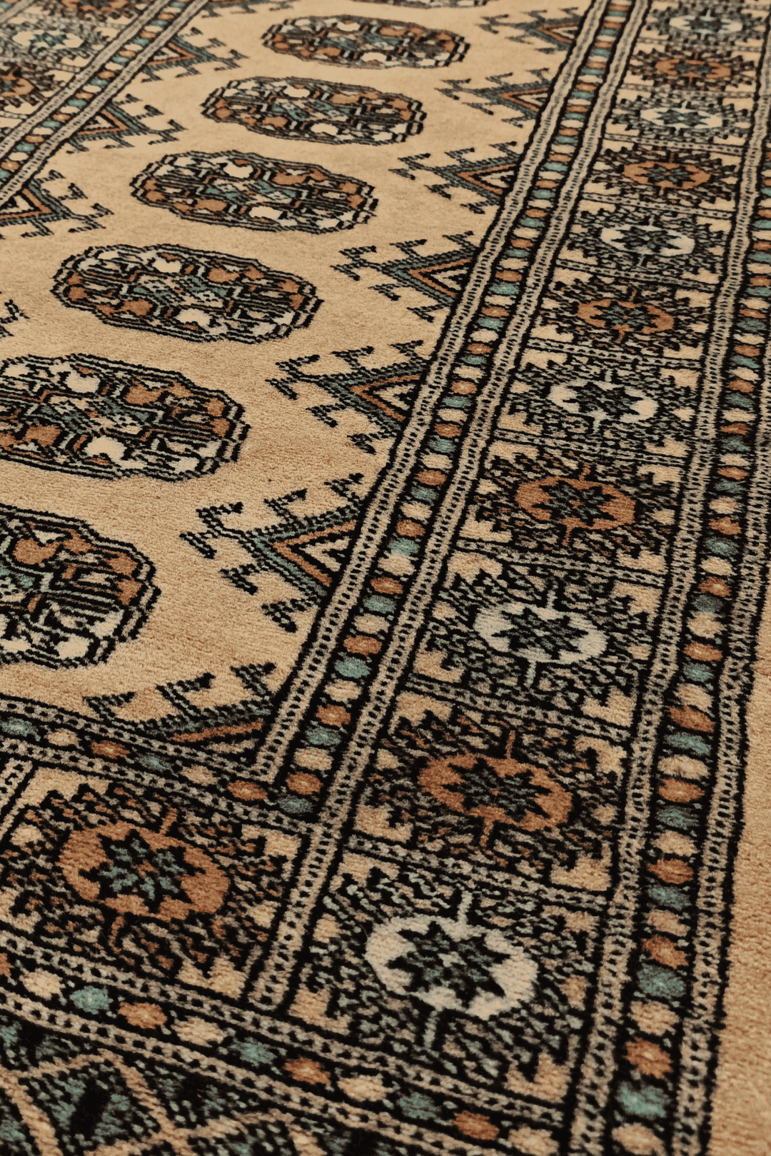 Turkmen gül motifs in camel and sea green on Bokhara runner