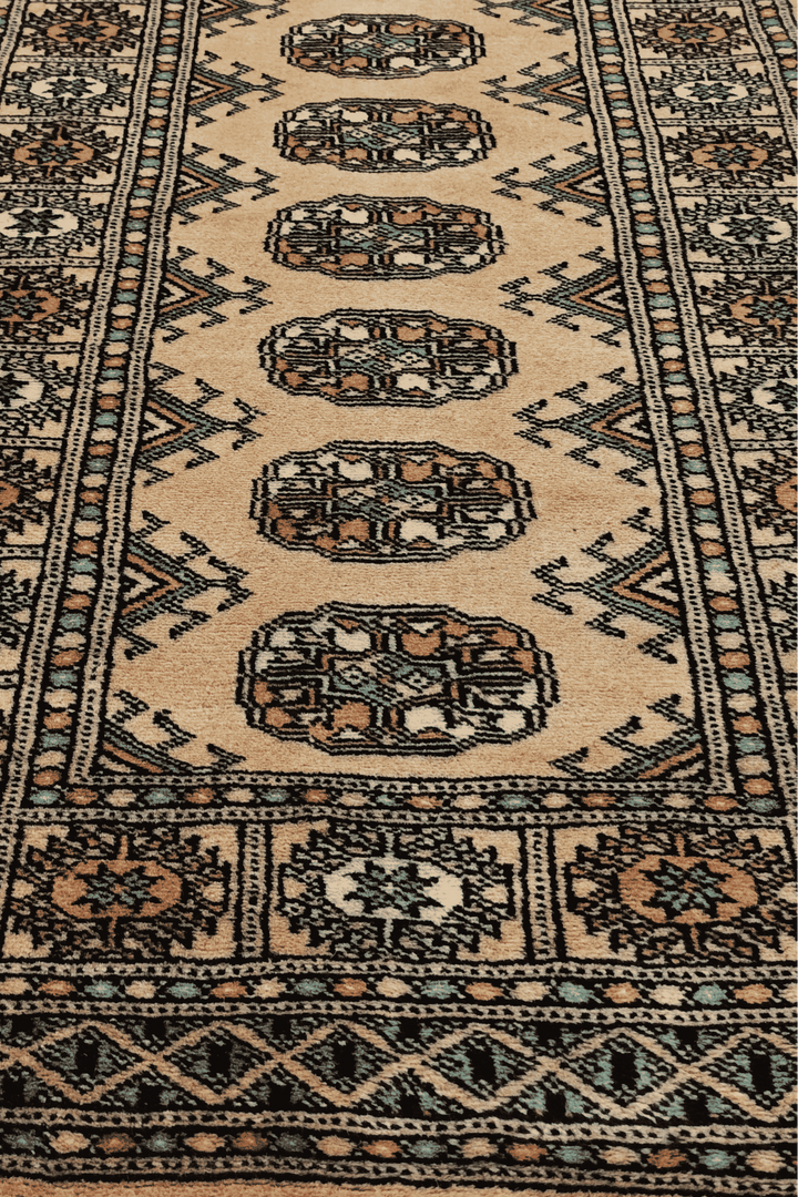 One-of-a-kind camel and sea green Pakistani Bokhara runner