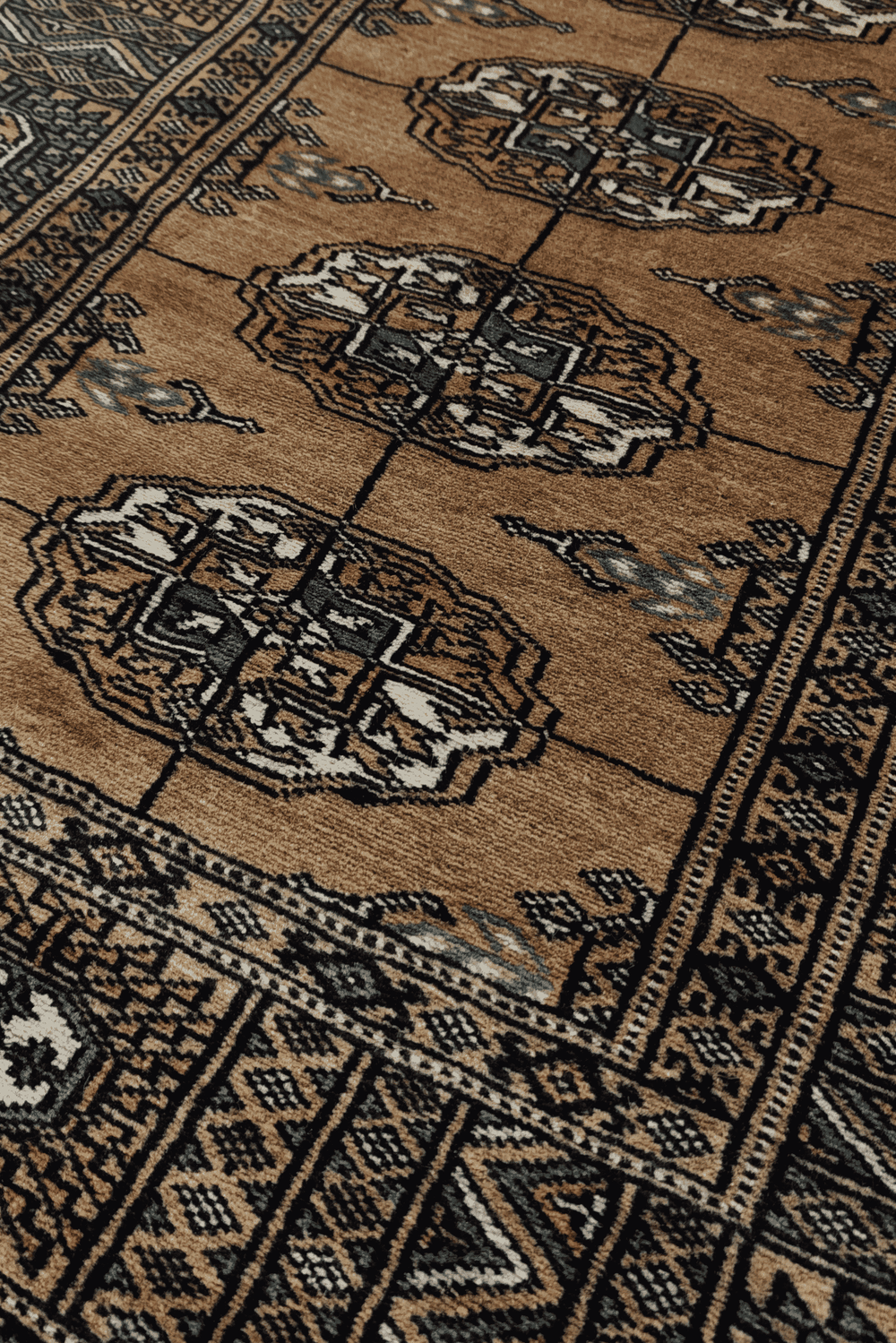 Turkmen gül motifs in camel and teal on long Bokhara runner