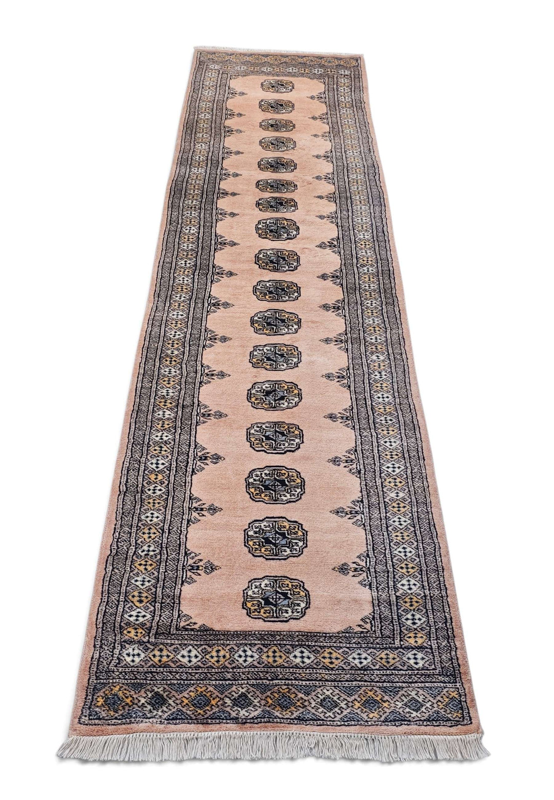 Border detail of salmon and espresso hand-knotted Bokhara runner