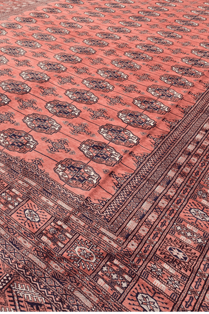 Turkmen gül motifs on rose Afghan Sherwan wool rug