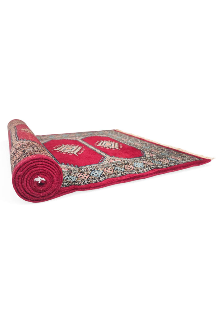 One-of-a-kind crimson and salmon Pakistani Bokhara runner