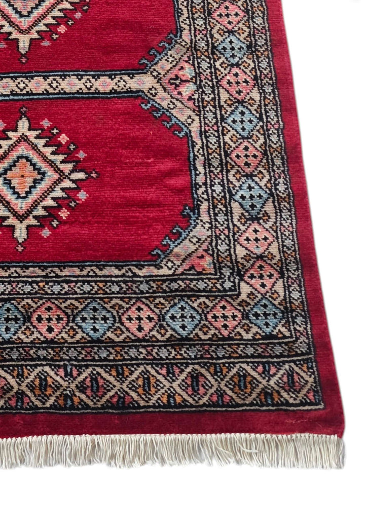 Crimson and salmon hand-knotted Bokhara wool runner, 246cm long
