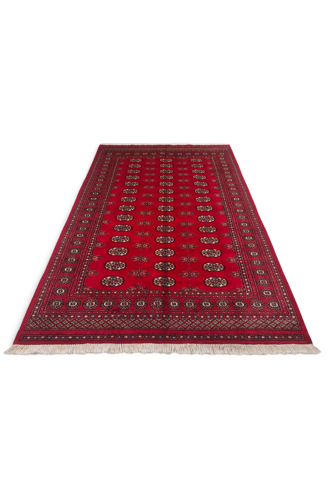 Border detail of crimson and cream hand-knotted Bokhara rug