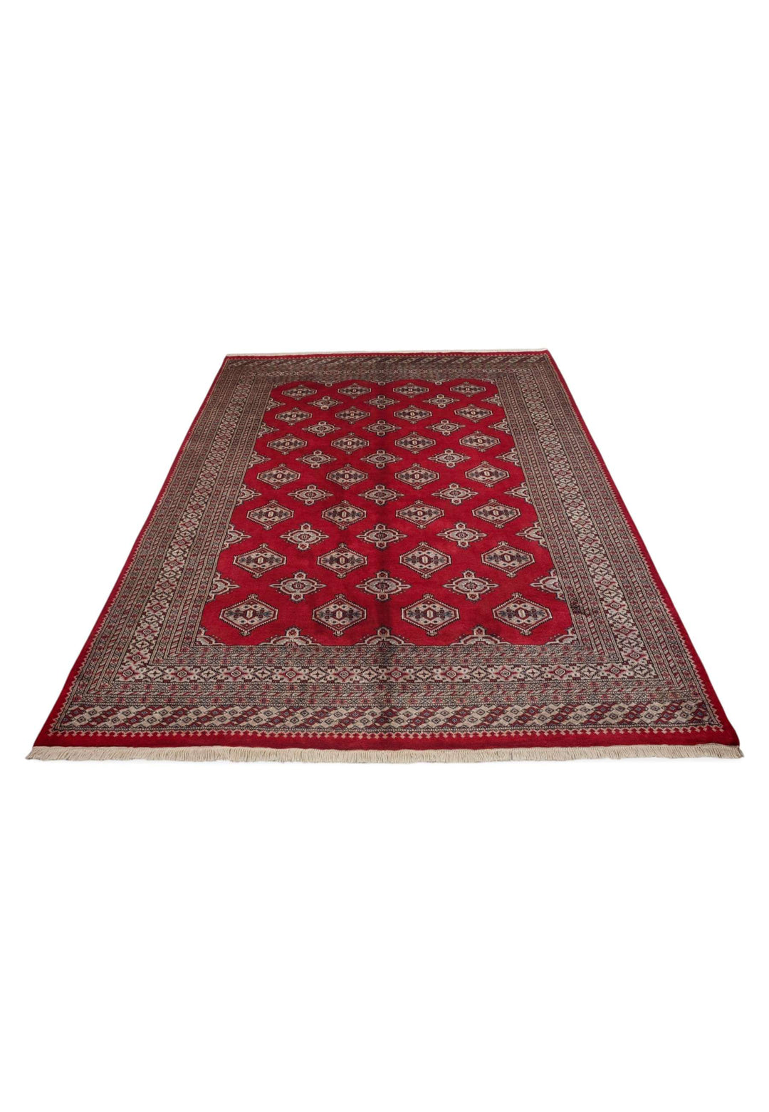 Border detail of deep crimson hand-knotted Bokhara wool rug