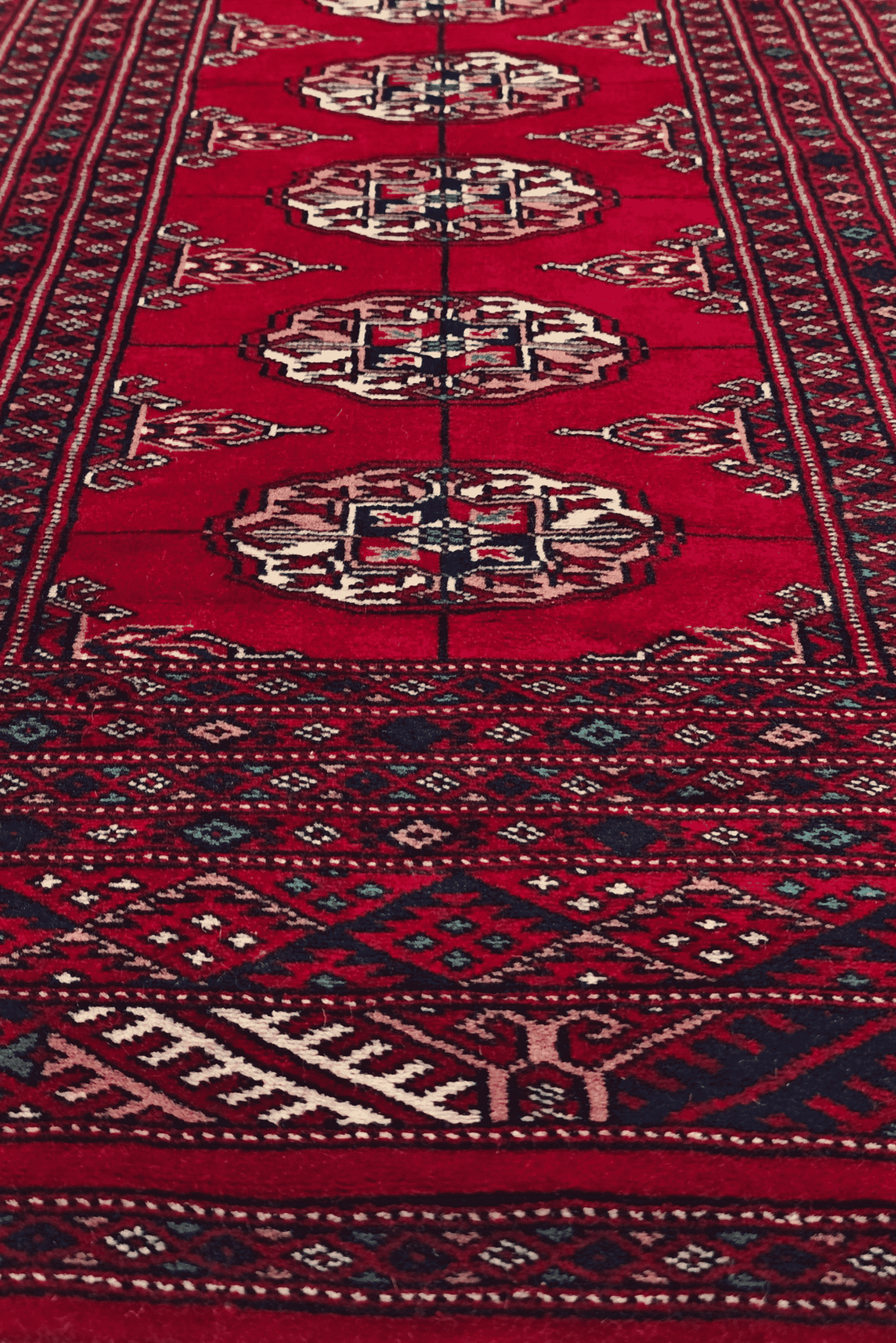 Crimson Pakistani Bokhara hand-knotted rug 70×156cm, hallway size