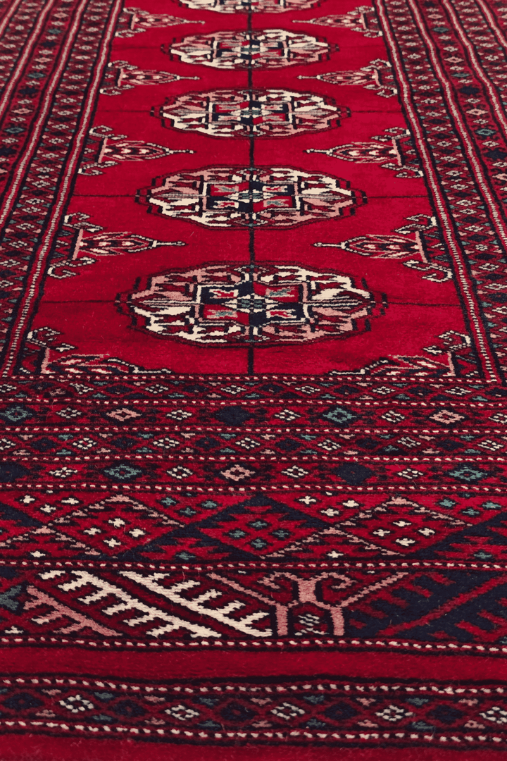Crimson Pakistani Bokhara hand-knotted rug 70×156cm, hallway size