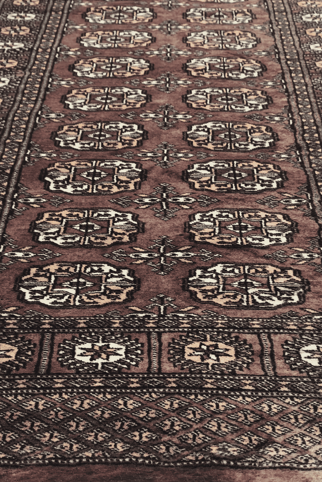 Hand-knotted taupe Bokhara runner with cream Turkmen güls