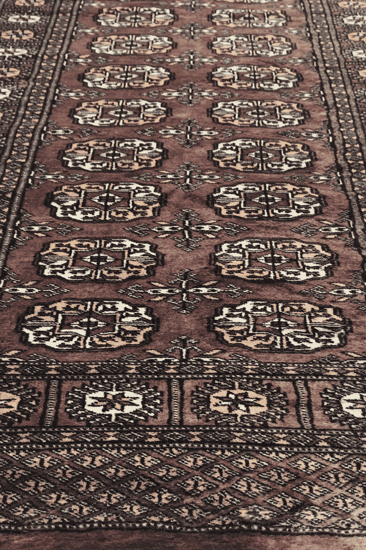 Hand-knotted taupe Bokhara runner with cream Turkmen güls