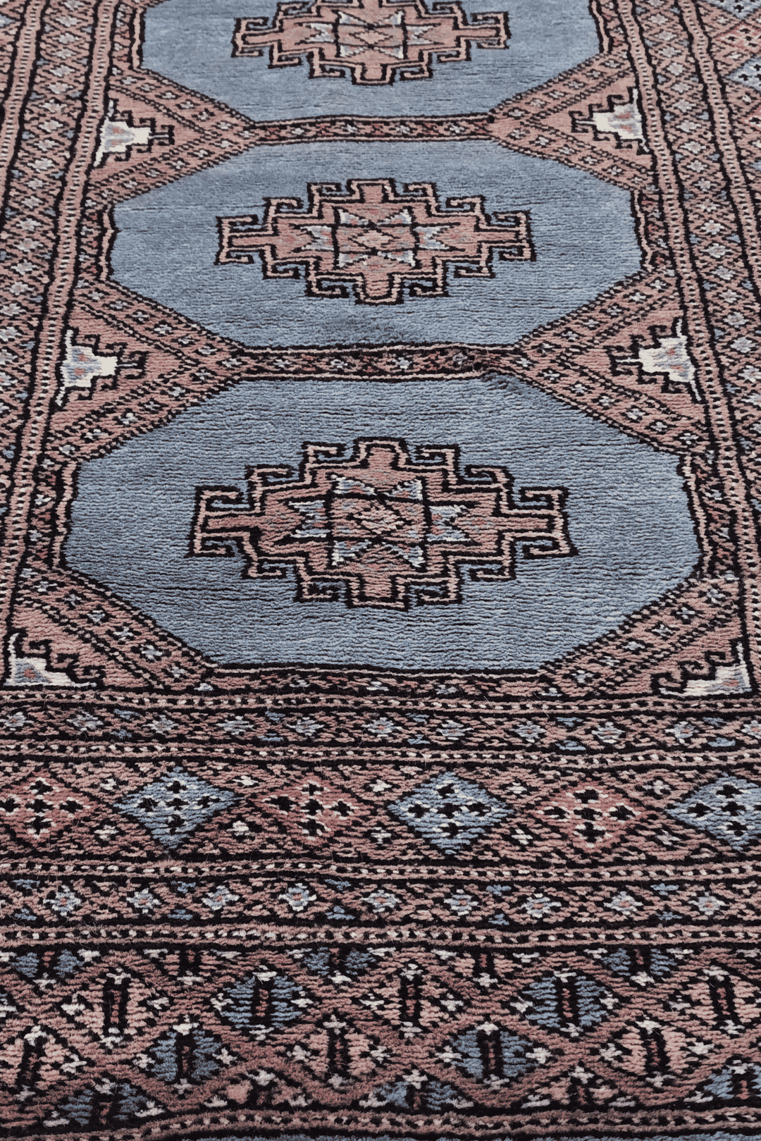 Hand-knotted dusty blue Bokhara runner with stepped medallions