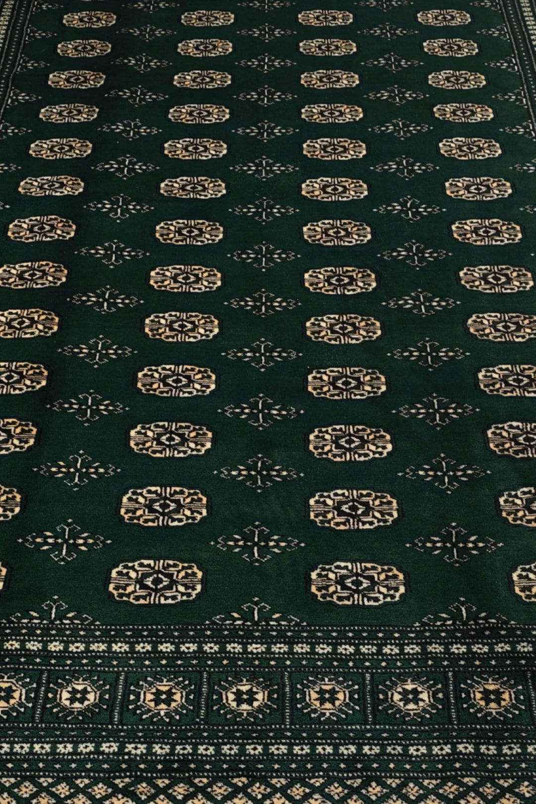 Forest green Bokhara wool rug 217×302cm, Pakistani craftsmanship