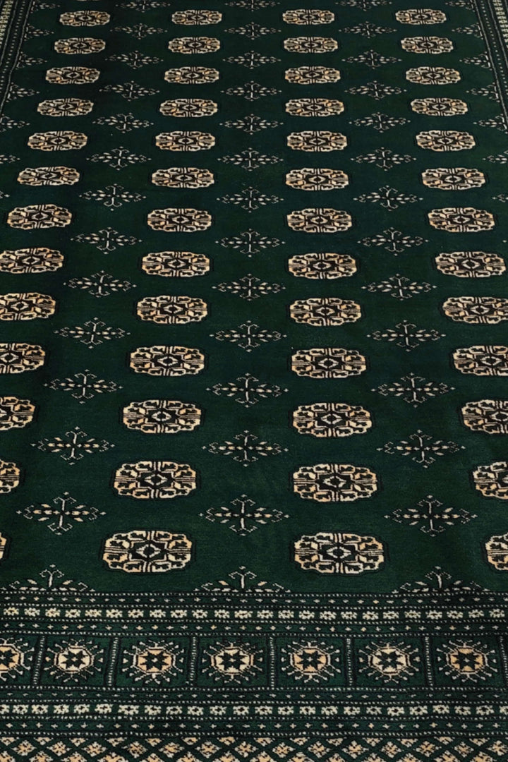 Forest green Bokhara wool rug 217×302cm, Pakistani craftsmanship