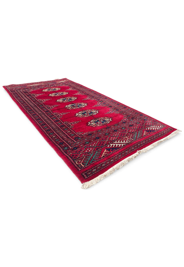 Madder red and ivory Turkmen gül rug for an entrance, 69×142cm