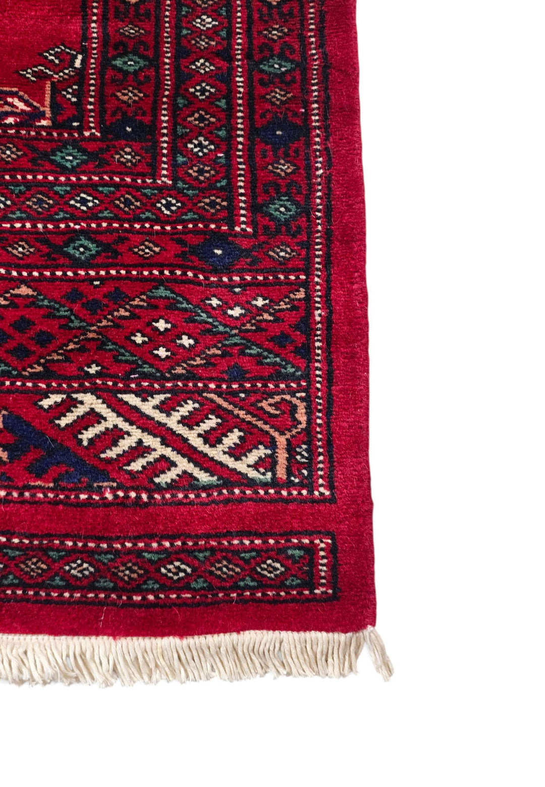 Hand-knotted madder red Bokhara rug with ivory Turkmen güls