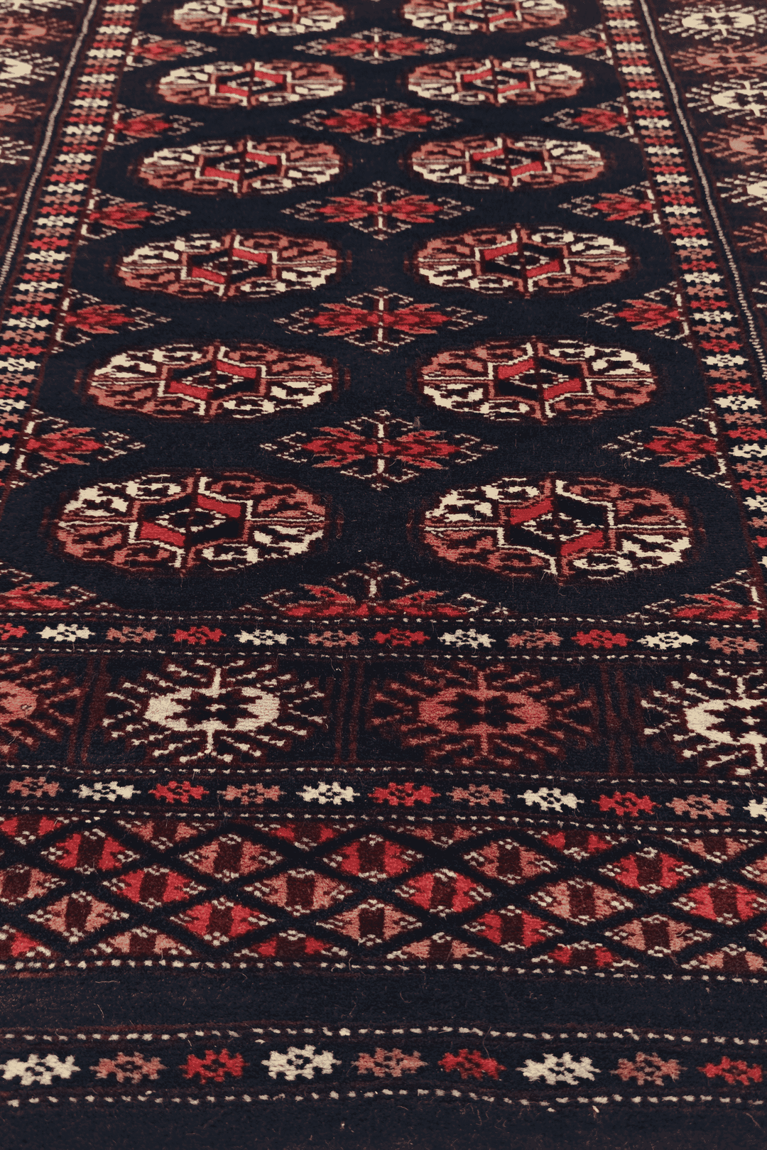 Hand-knotted navy Bokhara runner with rose Turkmen güls