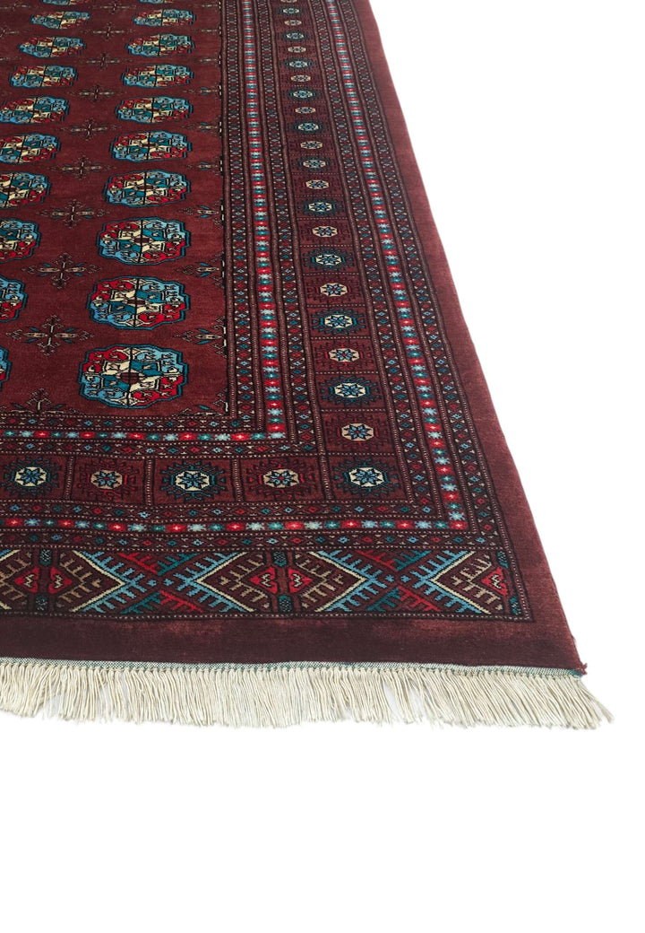 Oxblood and blue hand-knotted Bokhara wool rug, 169×270cm