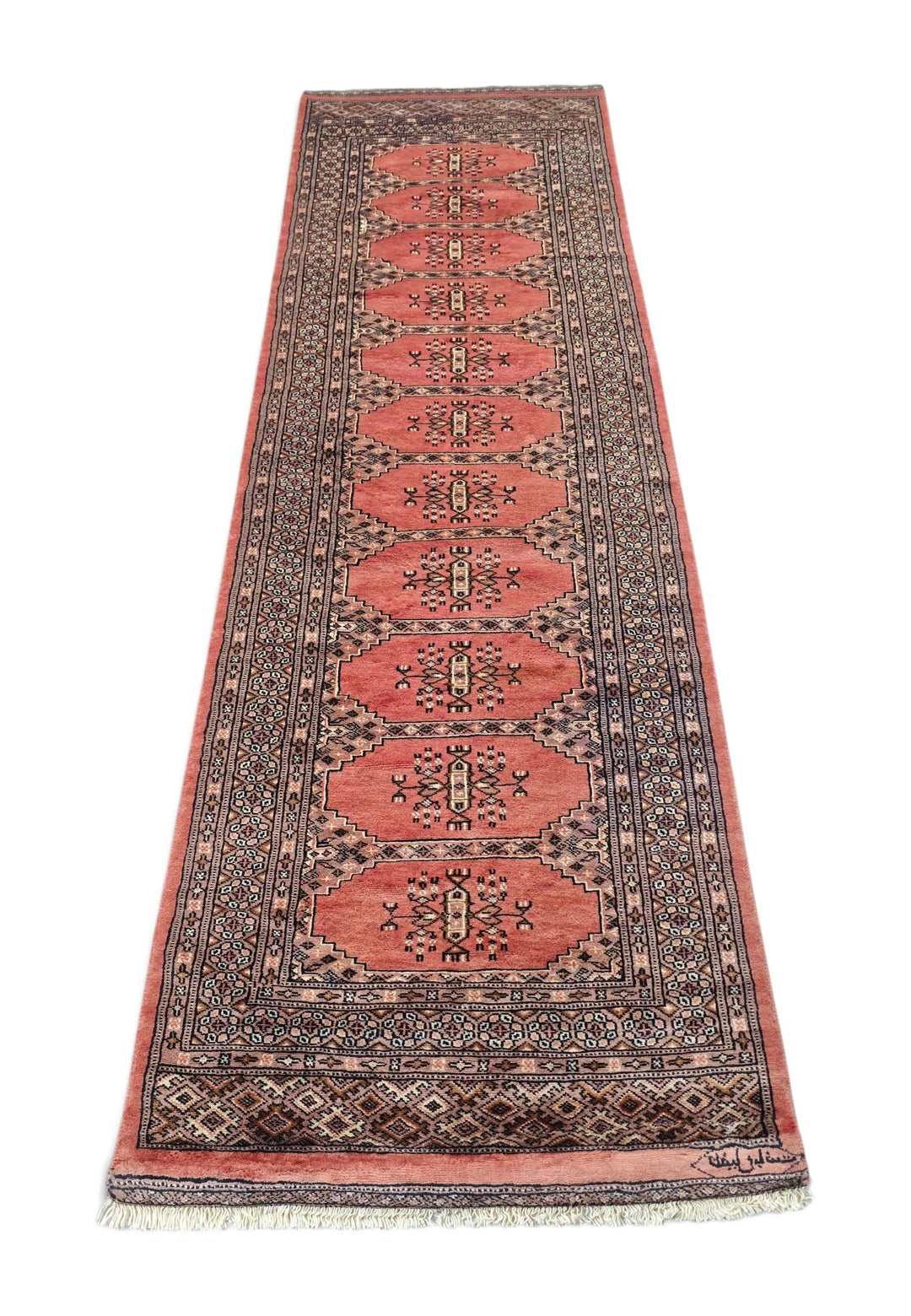 Border detail of salmon and ivory hand-knotted Bokhara runner