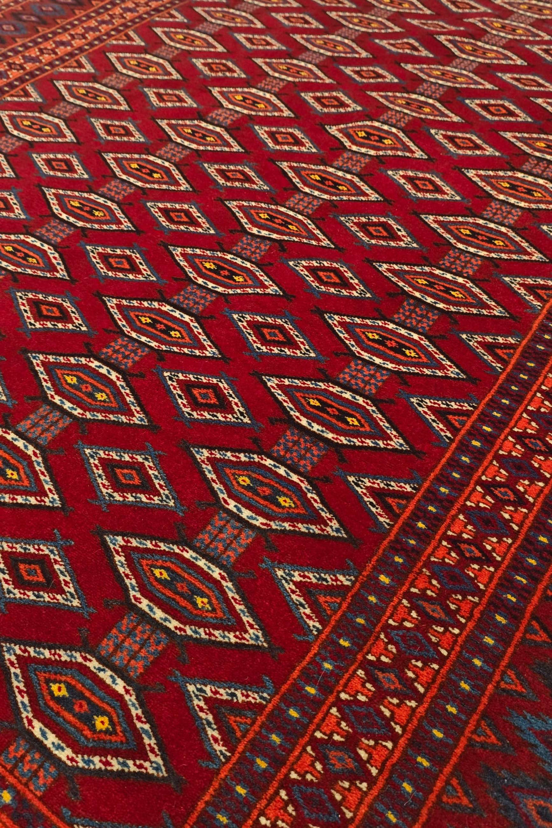 Turkmen lattice design in deep red on Afghan Sherwan rug