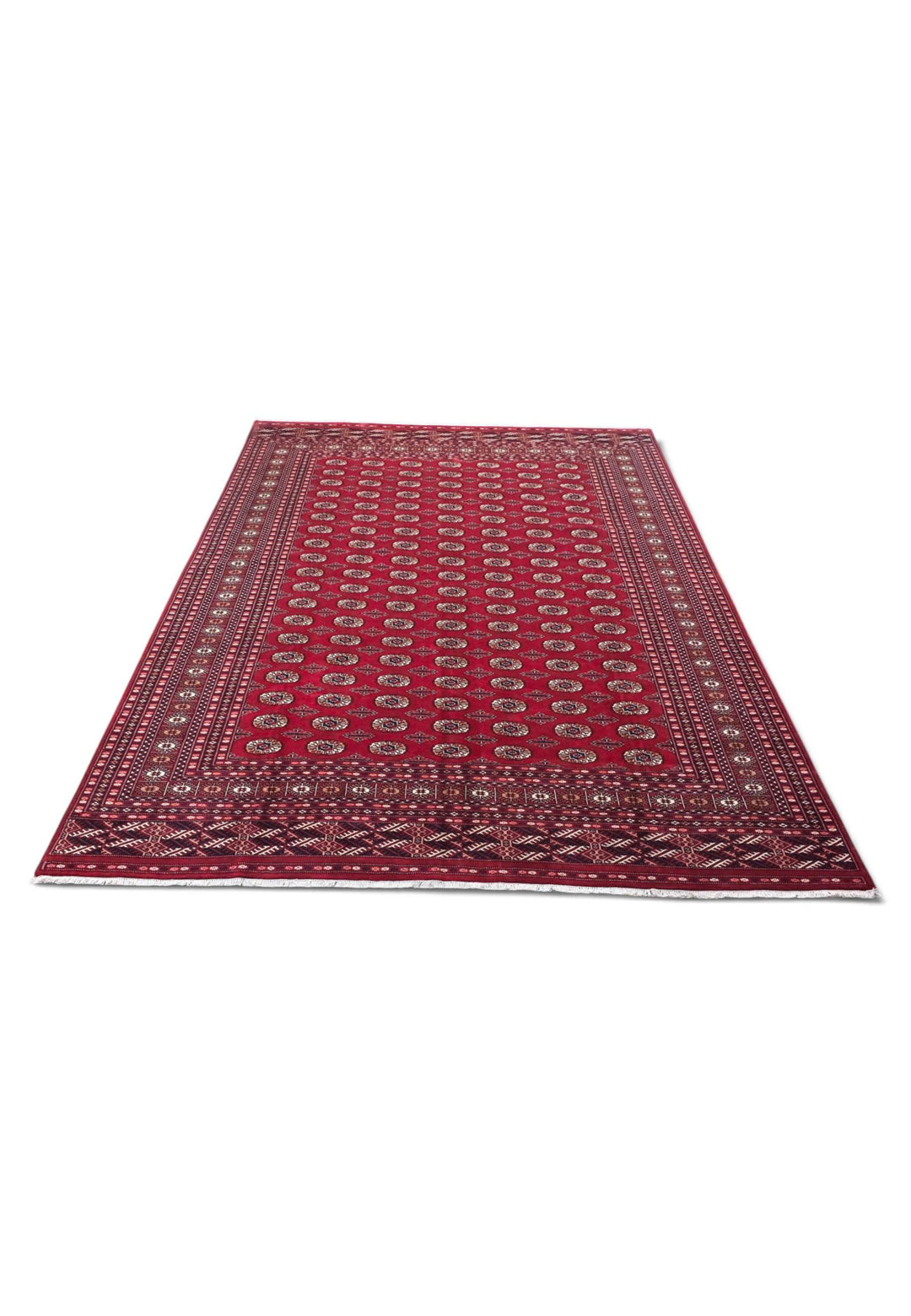 Border detail of ruby red hand-knotted Bokhara rug, large size