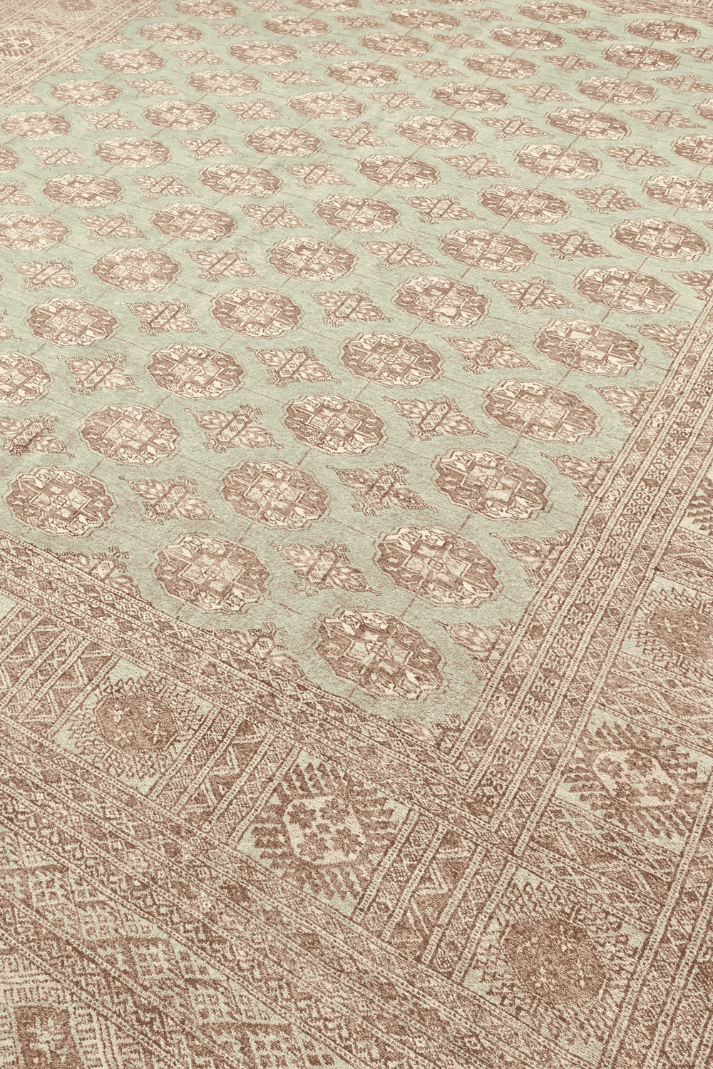 Turkmen gül motifs in sage and rose on Pakistani Bokhara rug
