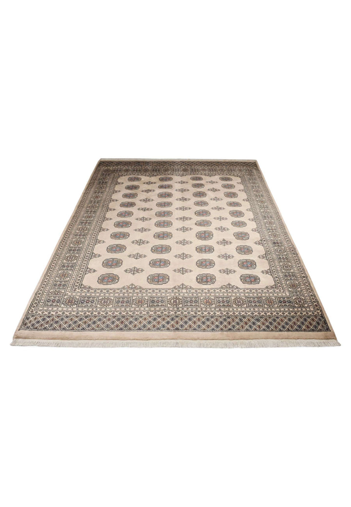 Wool pile texture of sand beige Turkmen gül Bokhara rug