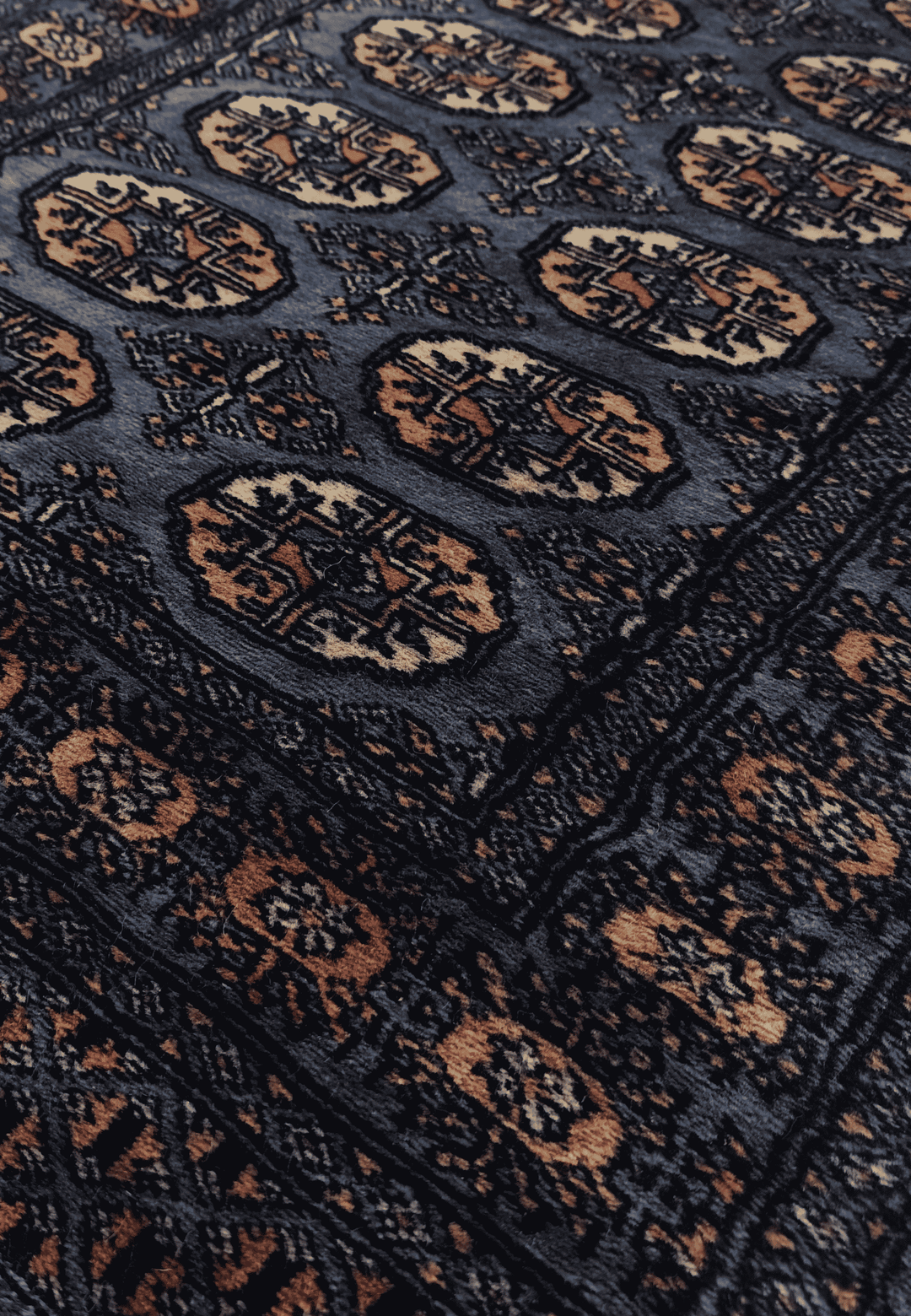 Turkmen gül motifs in slate blue and cream on Bokhara runner
