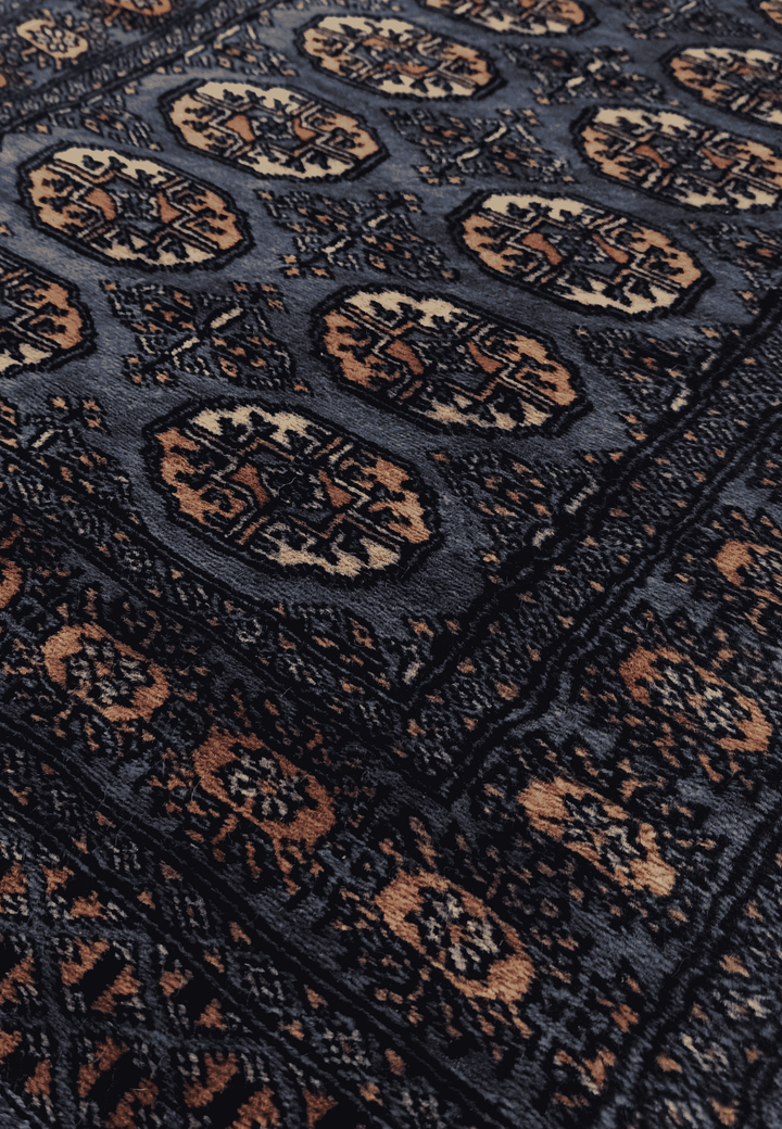 Turkmen gül motifs in slate blue and cream on Bokhara runner