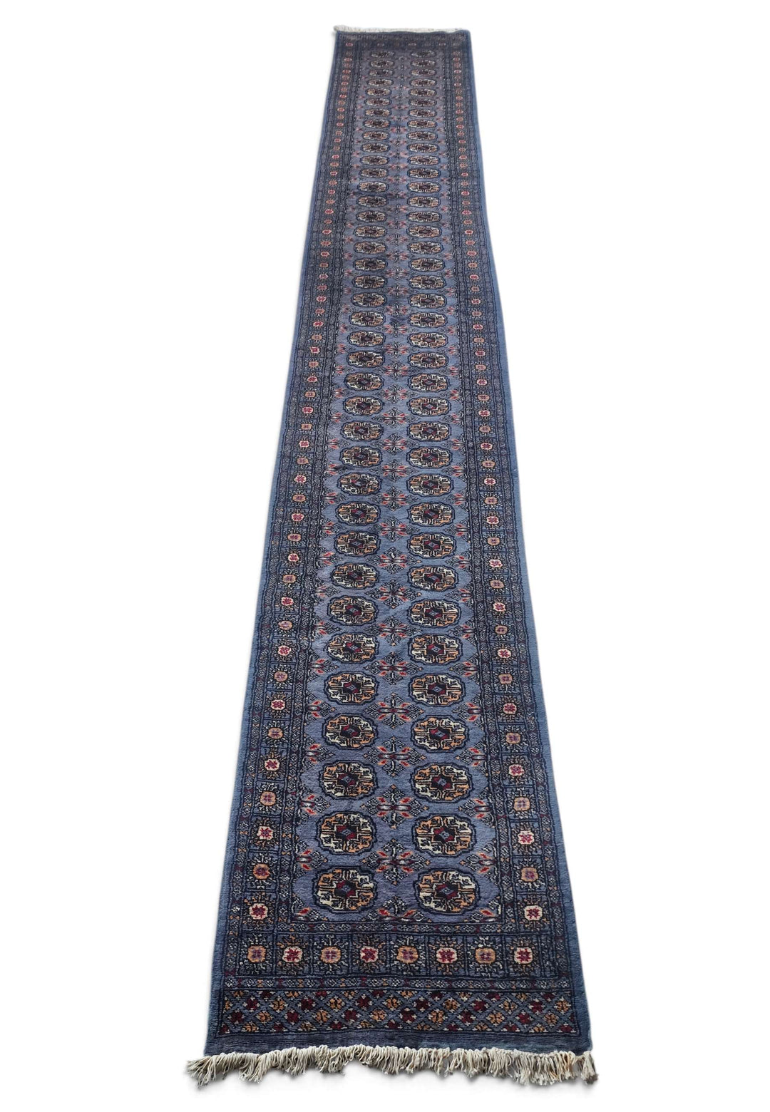 Border detail of slate blue and camel hand-knotted Bokhara runner