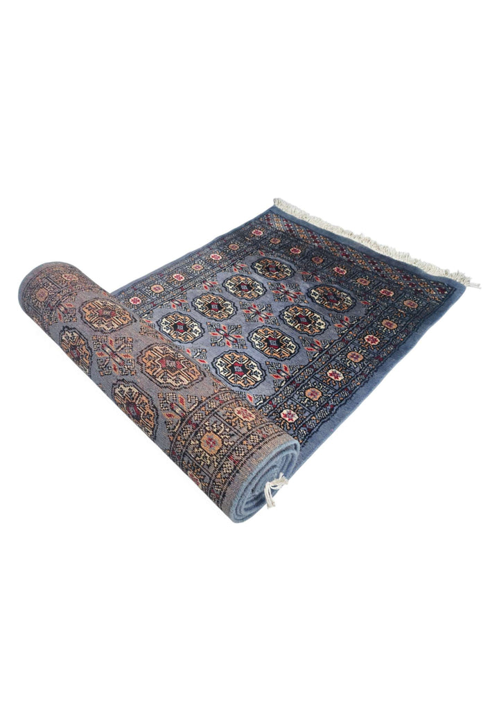 Slate blue and camel Turkmen gül runner for a long hallway