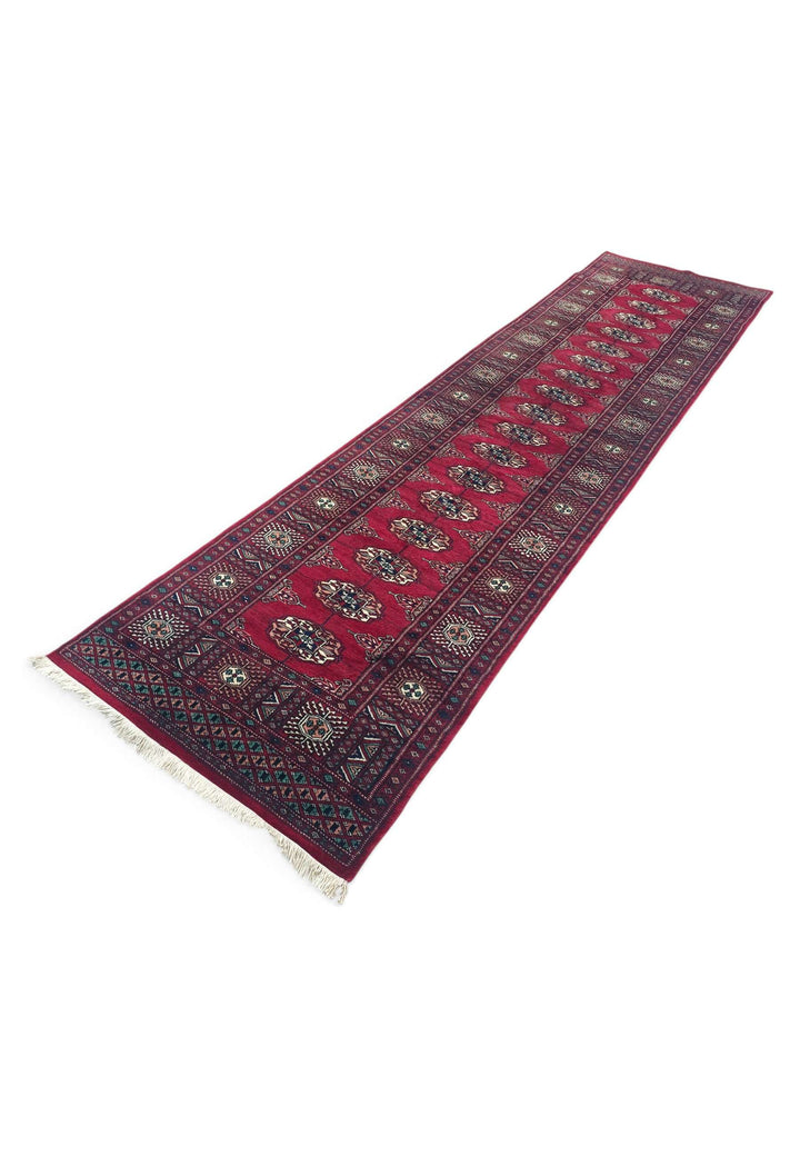 Hand-knotted wool pile of wine red Bokhara runner, 75×299cm