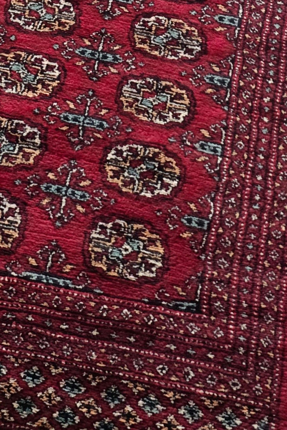 Turkmen gül motifs on wine red Bokhara corridor runner