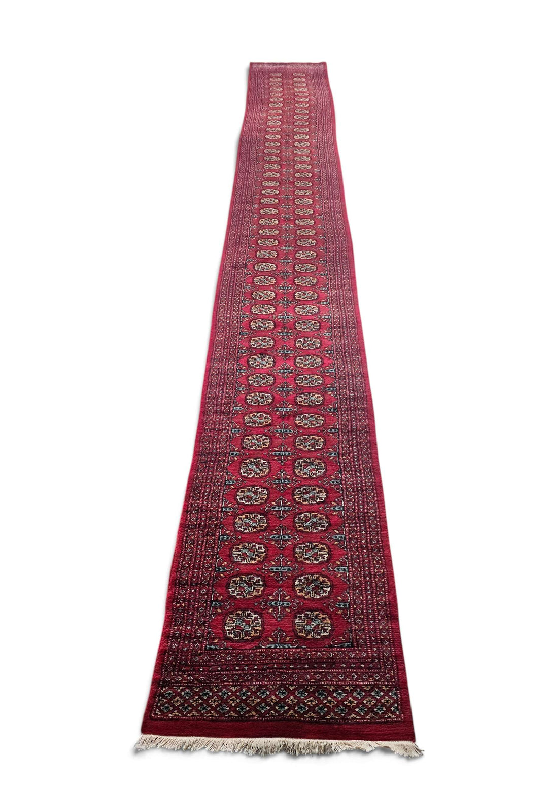 Border detail of wine red hand-knotted Bokhara runner