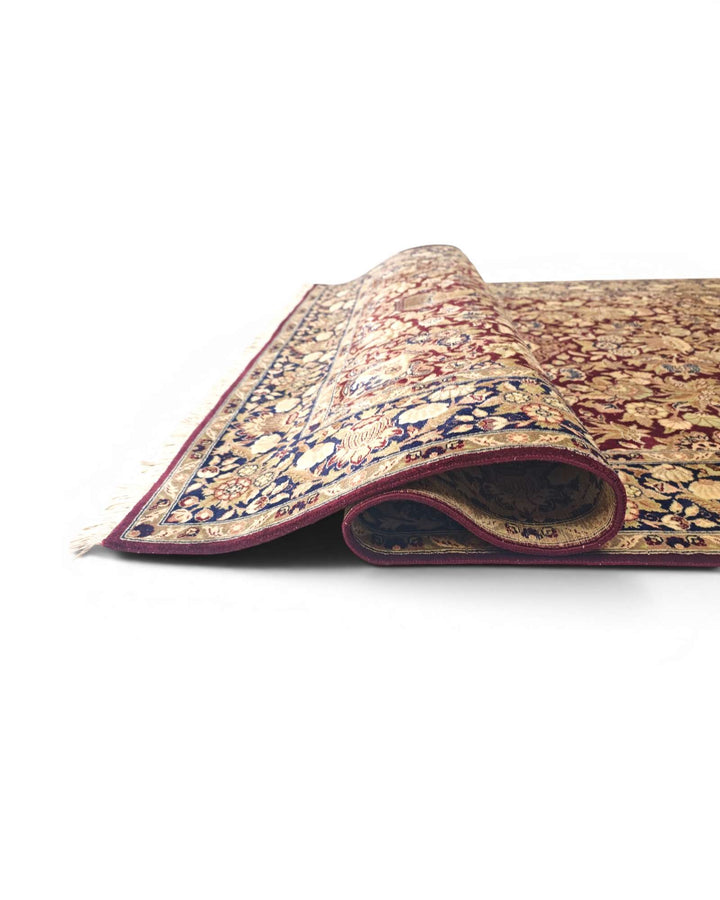 Oxblood vase garden Tabriz rug detail, double-knot weave