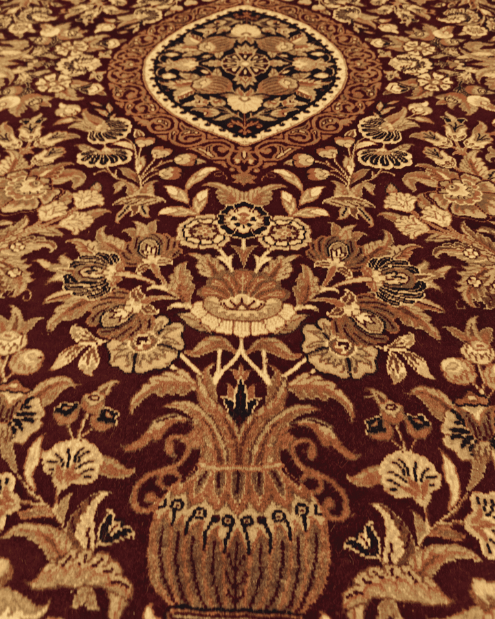 Corner of oxblood vase garden Pakistani double-knot rug