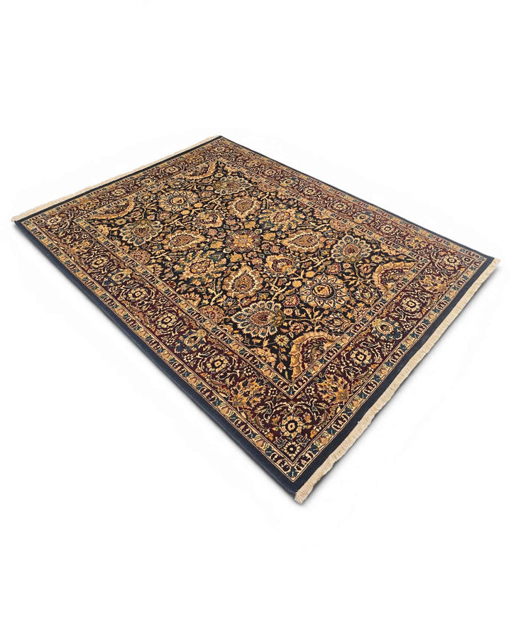 One-of-a-kind jet black and gold Tabriz Pakistani rug