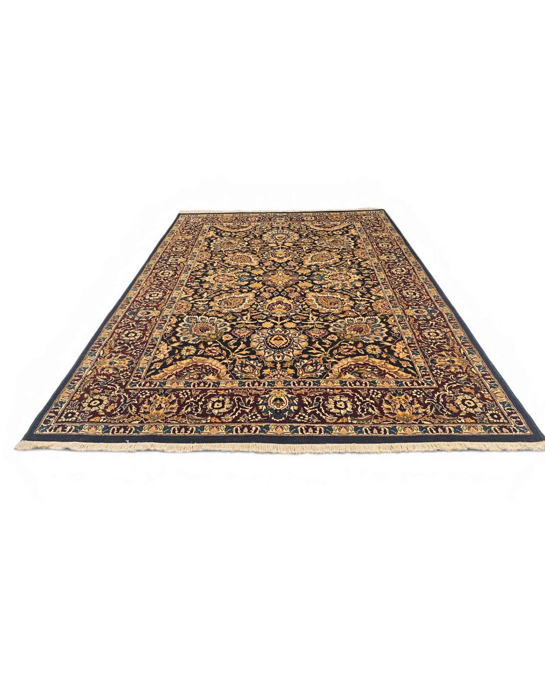Fringe of jet black and gold Tabriz hand-knotted rug