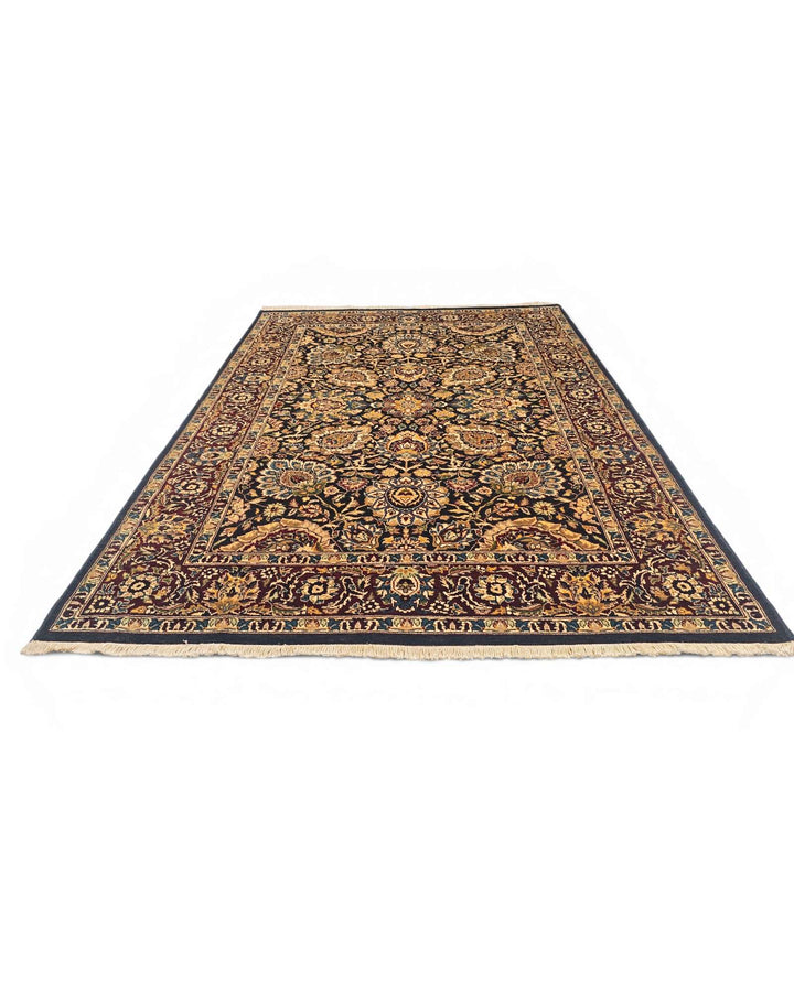 Fringe of jet black and gold Tabriz hand-knotted rug