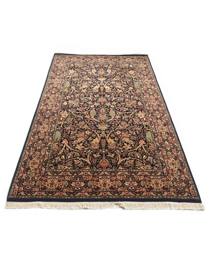 One-of-a-kind black garden floral Tabriz Pakistani rug