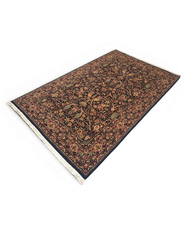 Fringe of black garden floral Tabriz hand-knotted rug