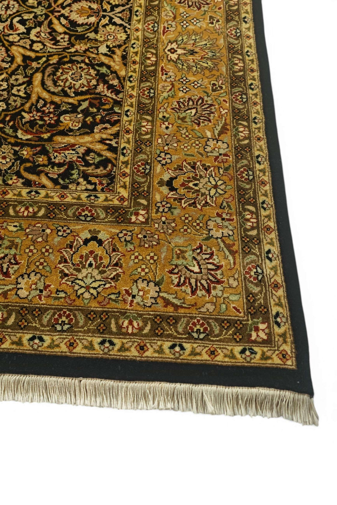 Corner of black gold vine Pakistani double-knot rug