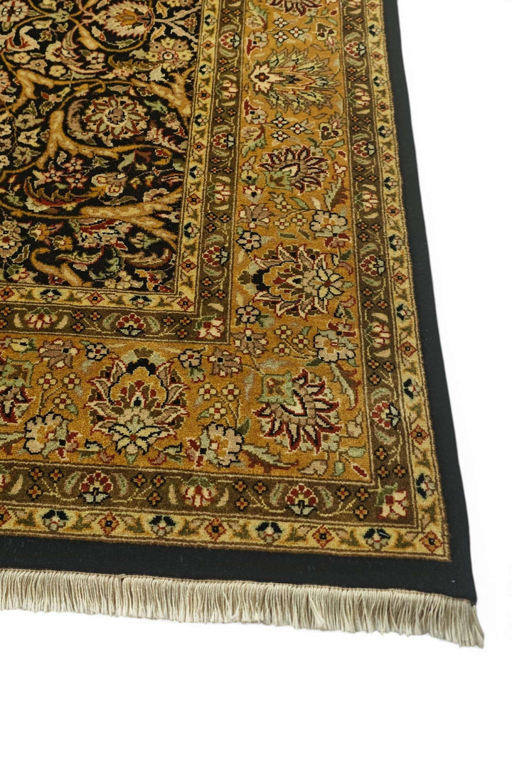 Corner of black gold vine Pakistani double-knot rug