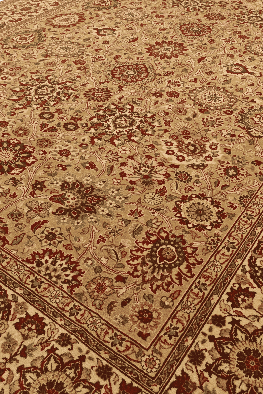 Tabriz floral detail in gold and ivory on Pakistani rug