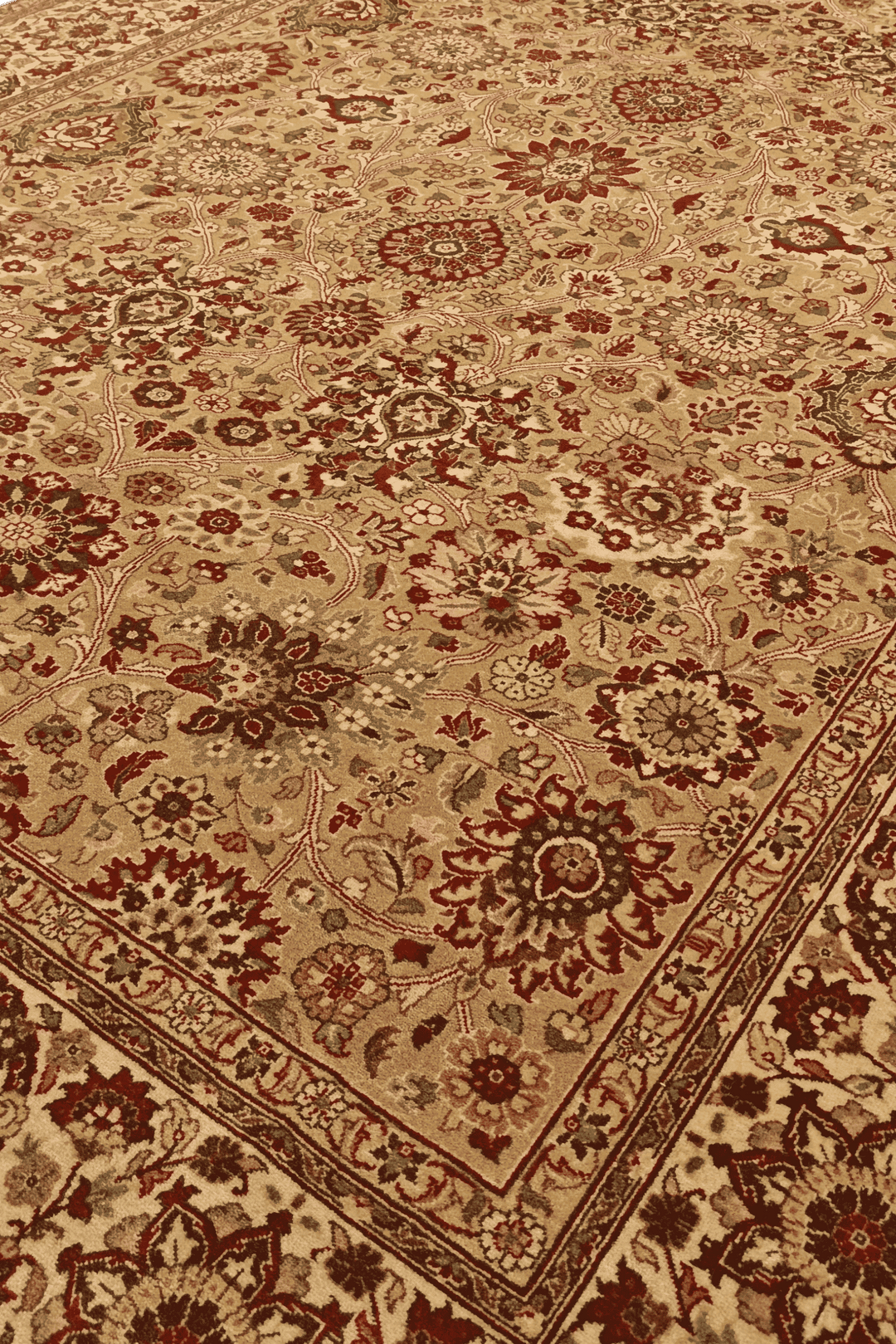 Tabriz floral detail in gold and ivory on Pakistani rug