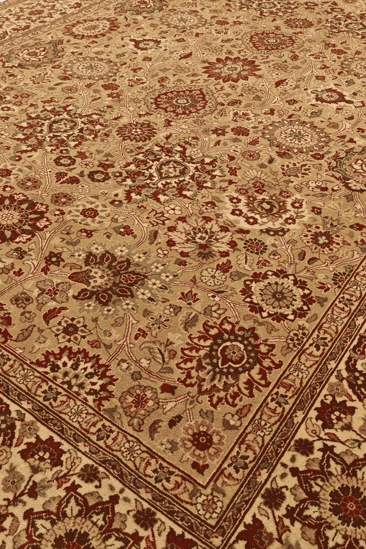 Tabriz floral detail in gold and ivory on Pakistani rug