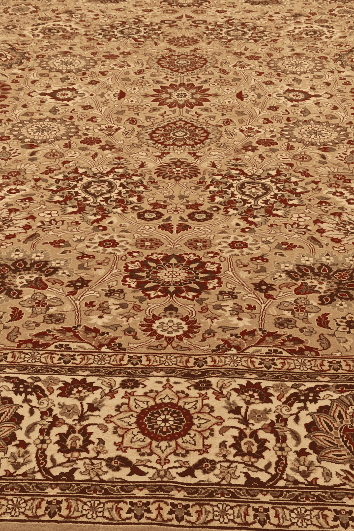 Fringe of gold and ivory Tabriz hand-knotted rug
