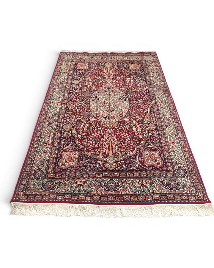 Hand-knotted wool pile of ruby red Tabriz rug